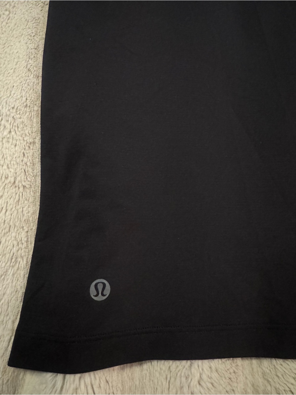 Lululemon Black ultralight hip-length t-shirt size 12